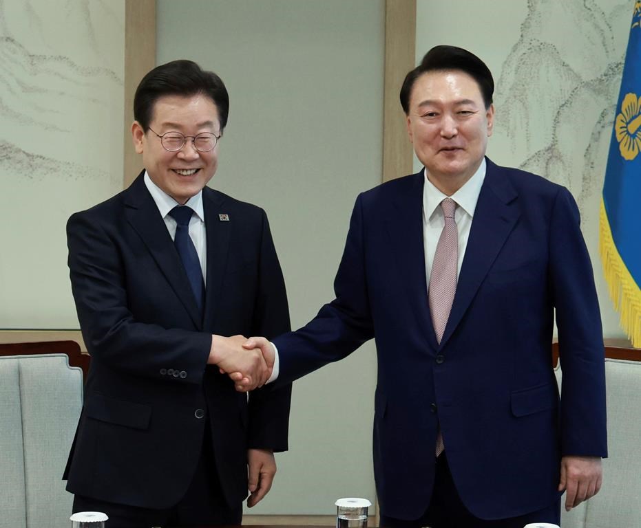 South Korea's president talks to opposition about cooperation after his